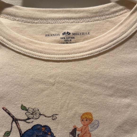 Brandy Melville Cream Tee with Blue and Orange Design - Picture 2 of 4